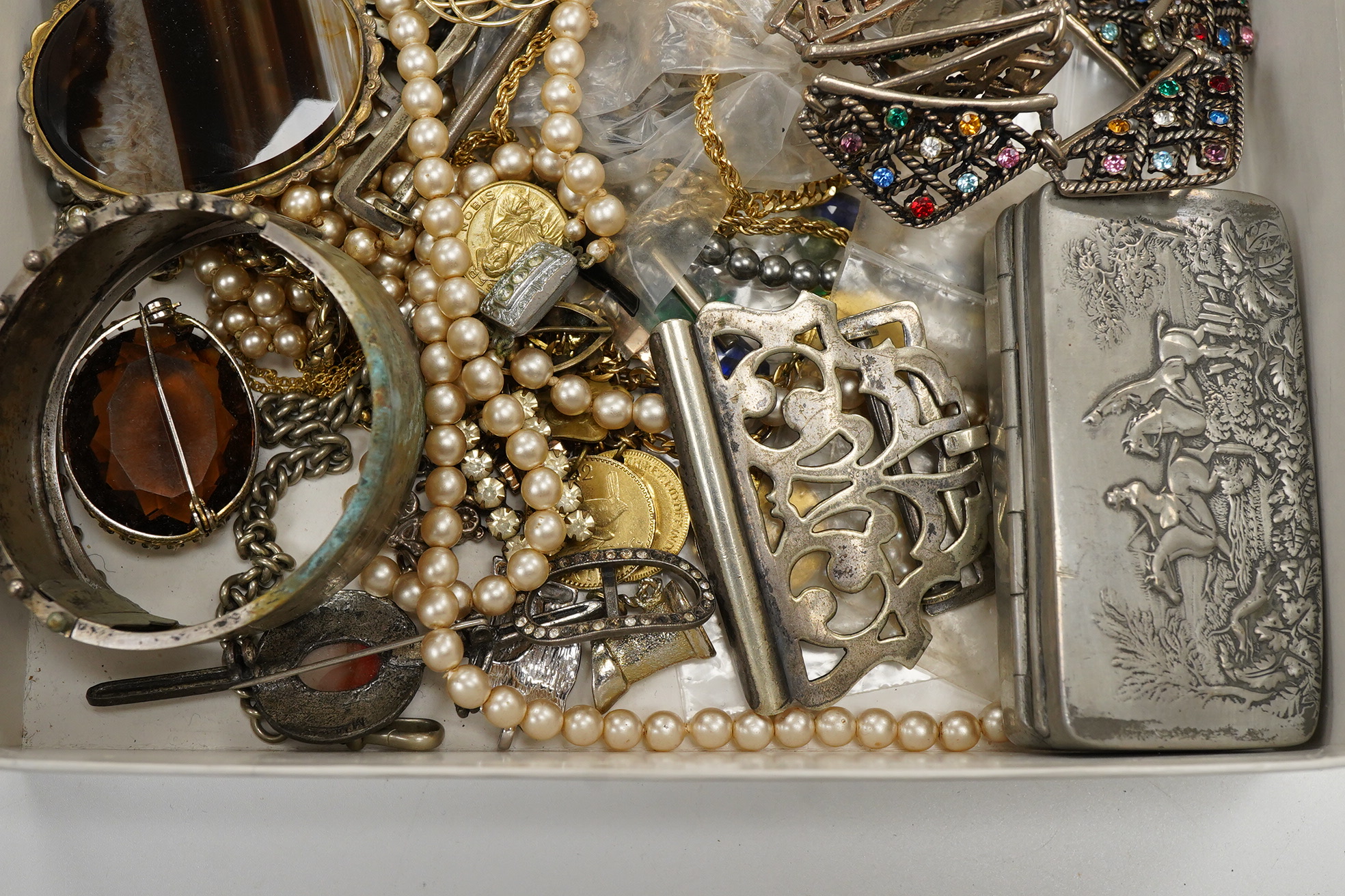 A group of assorted mainly costume jewellery, including bangles, ring, necklaces etc. together with a Cornish Pewter snuff box.
